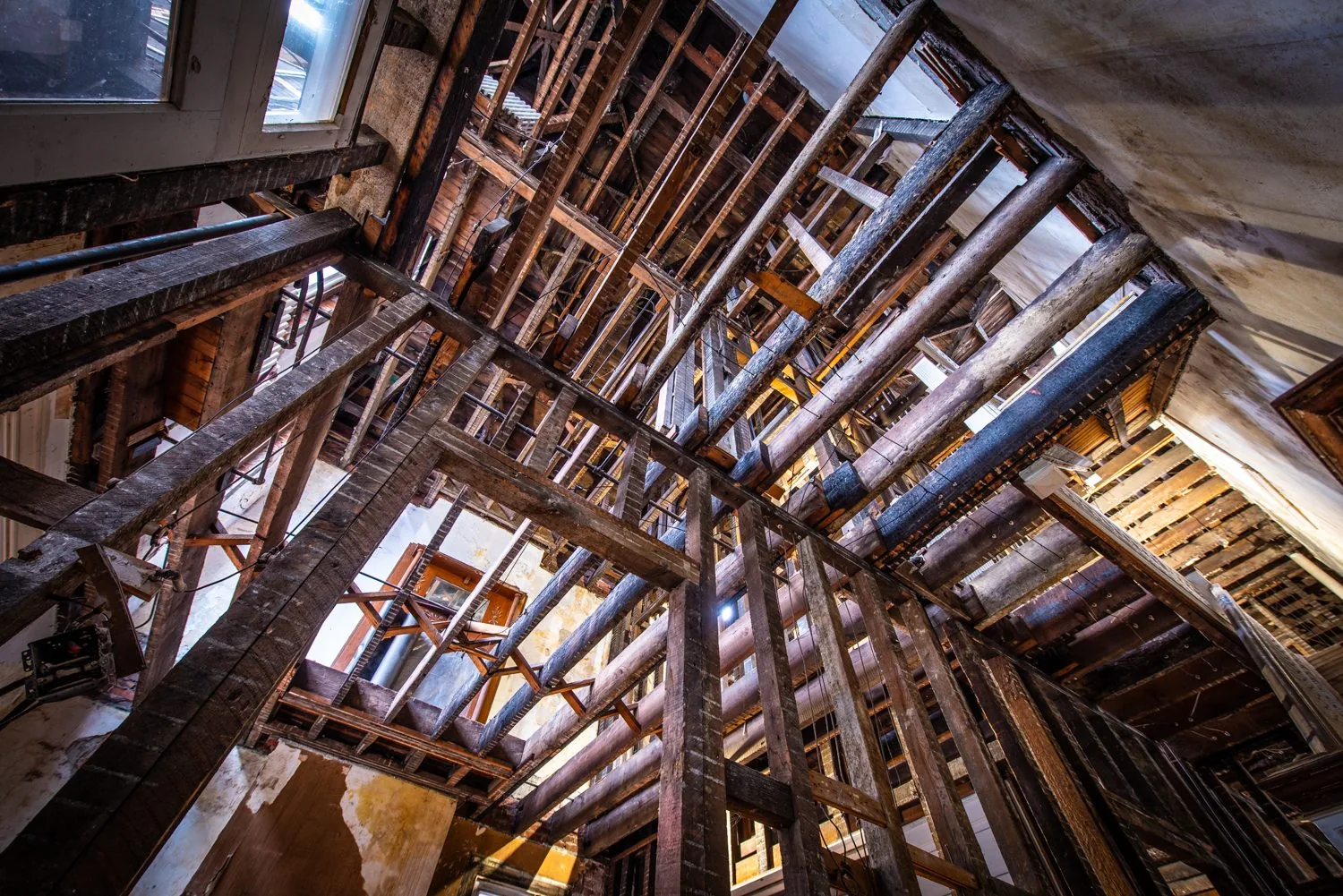 Structural framing inside a Romero Remodeling project, seen from the floor up